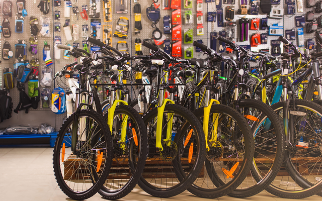 Beyond Halfords: Growth in Motoring, Pressure in Cycling